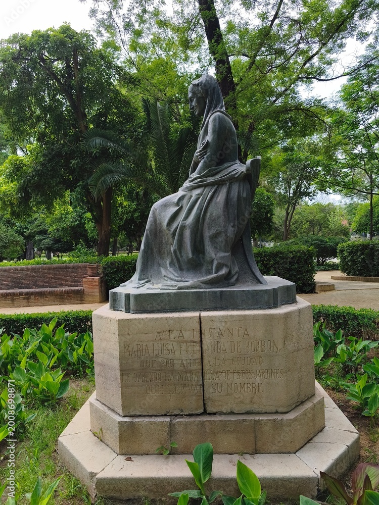 Obraz premium Bronze statue of Infanta Maria Luisa de Borbon in Parque Maria Luisa, Seville, Spain