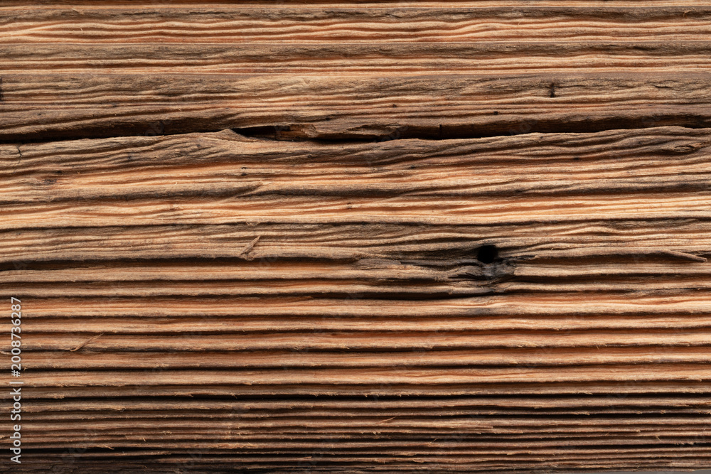 Fototapeta premium Old wood textured background. Dark driftwood surface, burnt wood brushing, macro brown floor