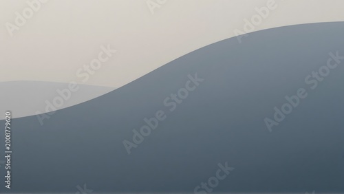 Abstract landscape of rolling hills or sand dunes in soft blue and gray tones with morning mist