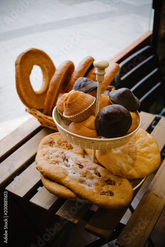 Photography Basket of pastries filled in a bakery with typical sweets from Cuenca, Spain