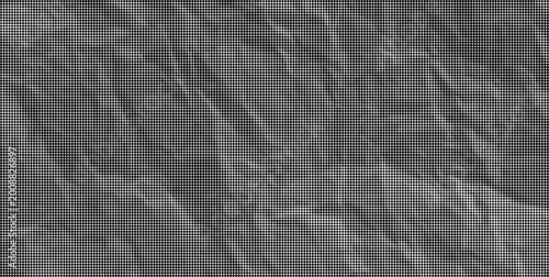 Foto Close-up of a crumpled gray paper texture with deep folds and creases