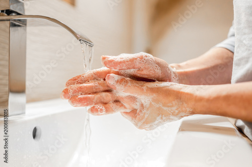 Women'S Hands With Soap Bubbles