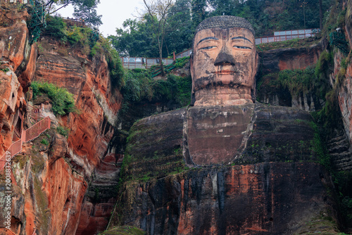 Canvas Print Leshan giant buddha carved into a red cliff in china