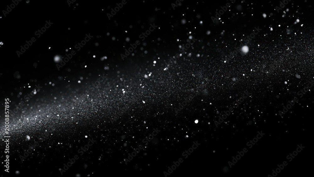 Fototapeta premium Mesmerizing glittering particles resembling cosmic dust or falling snow on a dark backdrop