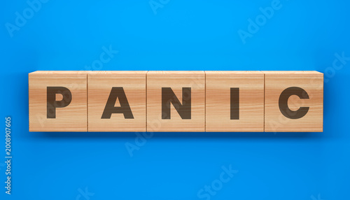 Valokuva Word Block of Panic: A stark visual representation of the word PANIC spelled out on wooden blocks, set against a solid blue backdrop