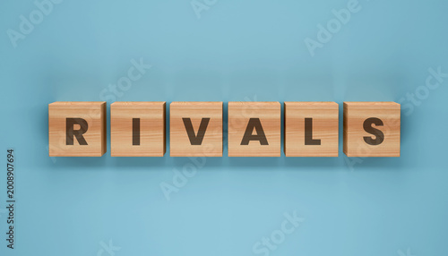 Photos RIVALS Blocks: Wooden blocks spelling out the word RIVALS on a light blue surface