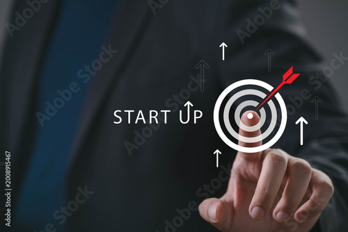Принти на полотні Business professional touching virtual target with arrow hitting the center, representing startup success, business strategy, goal achievement, growth mindset, innovation plan, entrepreneurial vision