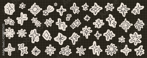 Tableau sur toile Collection of hand-drawn doodle stars and sparkles in paper cutout style