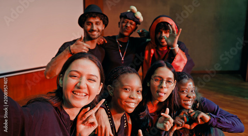 Photography Indian young adult gen z male man female look camera take selfie photos have fun joy hall stage place