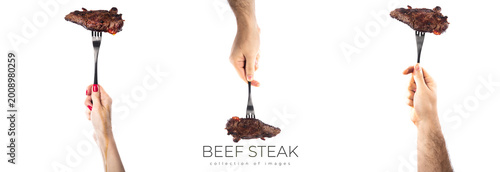 Tableau sur toile Marbled beef steak on fork isolated on white background