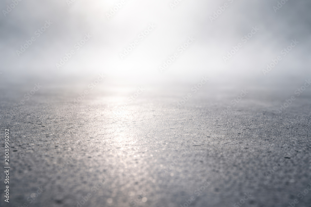 Obraz premium Misty background with reflective surface and soft lighting effects