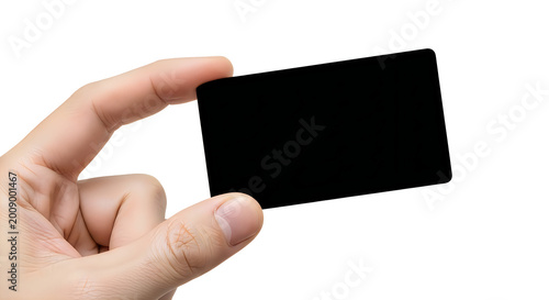 Hand holding a blank black card isolated on white background for business or identification purposes