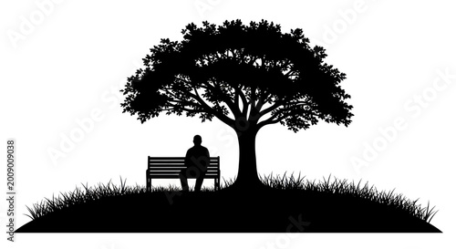 Man sitting on park bench alone.