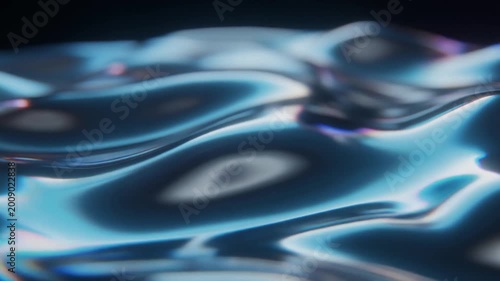macro close-up of iridescent liquid silver moving in zero gravity