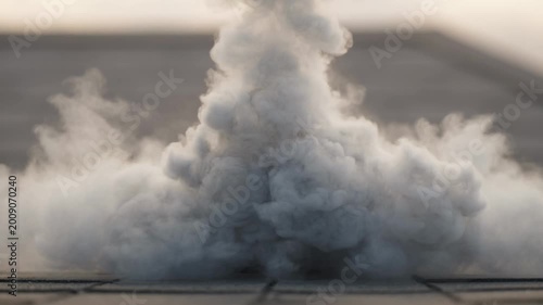Smoke Rising from the Ground, Cinematic 4K Video Clip of White Smoke on a Concrete Surface