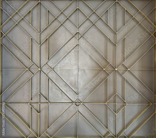Quadro su tela Lines of gold paint trimming in slanted diagonal pattern with grey background