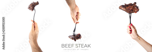 Photos Marbled beef steak on fork isolated on white background