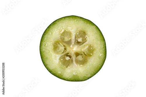 Feijoa slice revealing fresh succulent fruit segments