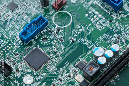 Photos Close-Up of Computer Motherboard with Microchip and Electronic Circuit Component