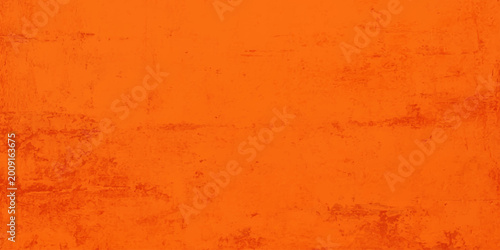 Fotografie An abstract orange textured background, a vibrant and dynamic surface with the vivid hue of a fiery sunset