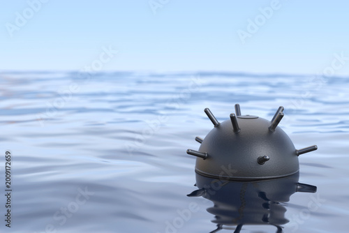 Moored naval mine floating in wavy water