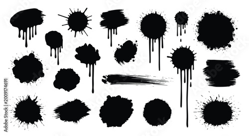 Collection of various black ink splats, drips, and brush strokes in a messy and expressive style for artistic graphic design.