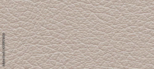 Tablou pe pânză Close-up of natural light beige leather texture with a prominent, granular surface and visible pores, perfect for luxury product backgrounds