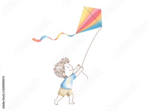 boy flying kite