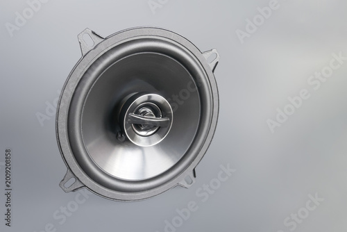 Bild auf Leinwand Audio speaker on a grey background, close-up