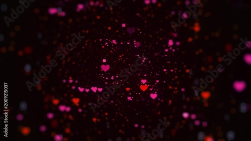 Glowing pink hearts and stars floating on a black background
