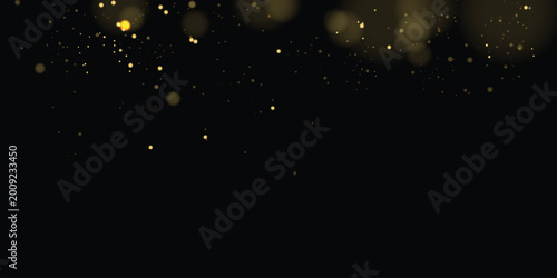 Quadro su tela Yellow dust glimmers in glowing light with sparkle, shimmer, glitter bokeh