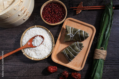 Zongzi ingredients and wrapped rice dumplings for Dragon Boat Festival