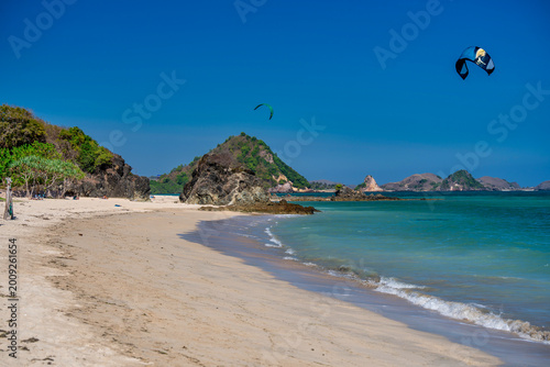 Foto Kuta Mandalika Lombok Indonesia stunning beach and coastal area on a sunny day