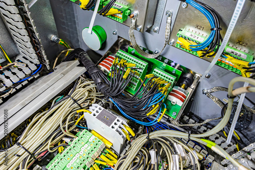 Εκτύπωση καμβά Close up of industrial electrical cabinet with complex wiring green terminal blo