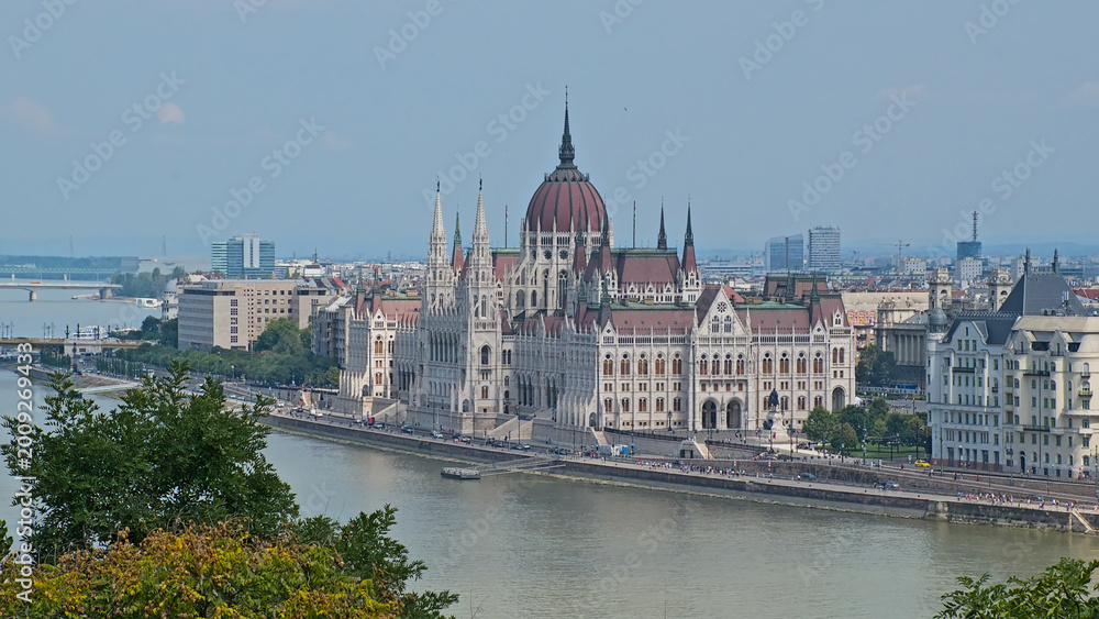Obraz premium High angle view on the Hungarian National parliament building in gothic revival style along Danube river in Budapest, Hungary 