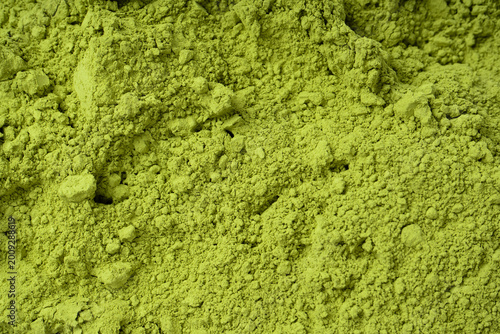Matcha tea, matcha powder as a background.