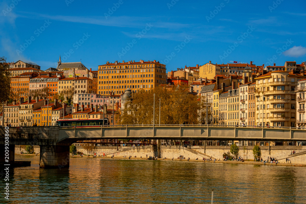 Fototapeta premium View of the architecture of the city of Lyon, France, from a cruise on the Saone.