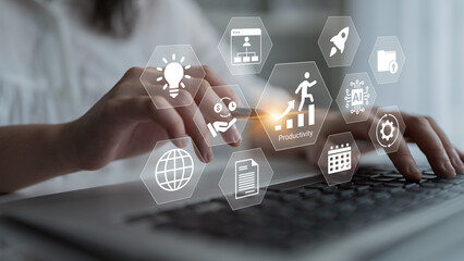 A woman types on a laptop surrounded by digital icons symbolizing productivity and innovation, representing modern business strategies and growth concepts. Gantry
