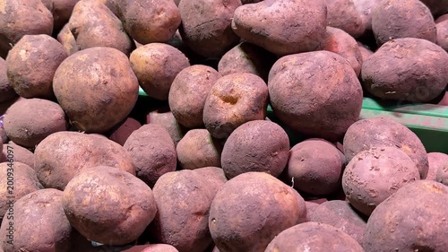 red potatoes on the table sold in the supermarket