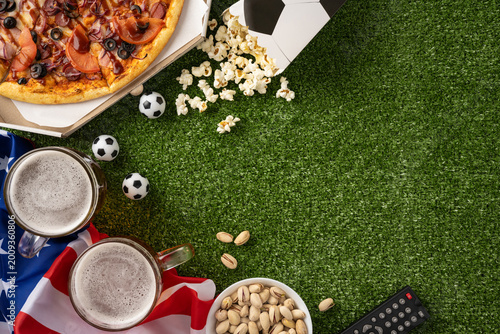Obraz na płótnie Football championship watch party with pizza beer snacks and USA flag on turf