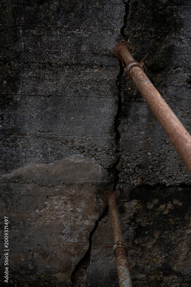 Fototapeta premium An old pipe laying on the ground