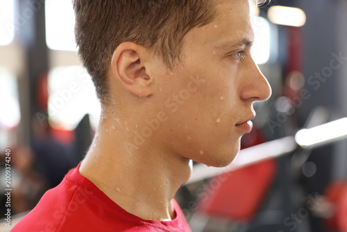 Konstfotografi Tired man sweating after workout in gym