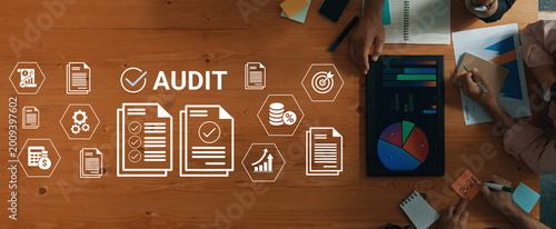Bilde på lerret A detailed view of an audit process featuring paperwork, charts, and graphs on a wooden table