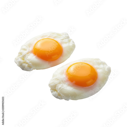 Two poached eggs with bright golden yolks and tender opaque whites on a transparent background with soft overhead lighting appetizing culinary presentation concept