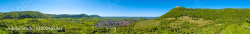 Panoramic view of Neuffen and Hohenneuffen on the Swabian Jura escarpment in spring, Baden-Württemberg, Germany