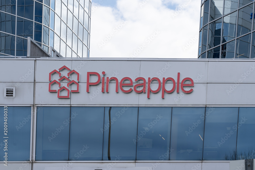 Fototapeta premium Toronto, Ontario, Canada - May 3, 2026: Pineapple headquarters on Gordon Baker Road, North York, Ontario, Canada. Pineapple Financial Inc. is a Canadian mortgage technology and brokerage company. 