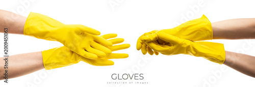 Canvas Print Hands up yellow rubber cleaning gloves holding rag isolated on white background