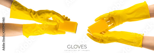 Fotografie Hands up yellow rubber cleaning gloves holding rag isolated on white background