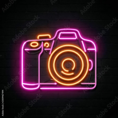 Vibrant neon-lit camera outline in pink and orange hues on dark background, sleek modern artistic photography concept