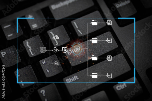 Cybersecurity concept on computer keyboard with digital data icons, representing data protection, encryption, secure access, network system, and information technology in modern digital environment.